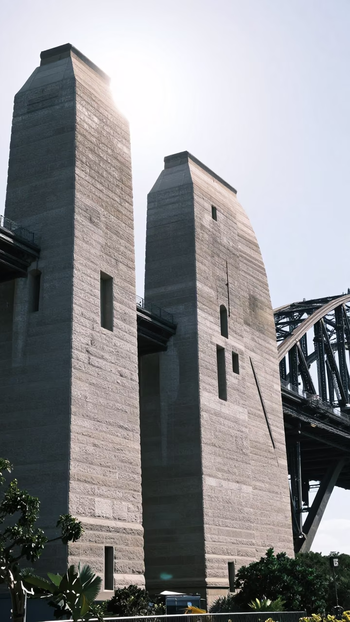 Noon Sunlight on Sydney Harbour Bridge Pylons and Harbour Water in in Sydney, New South Wales, Australia