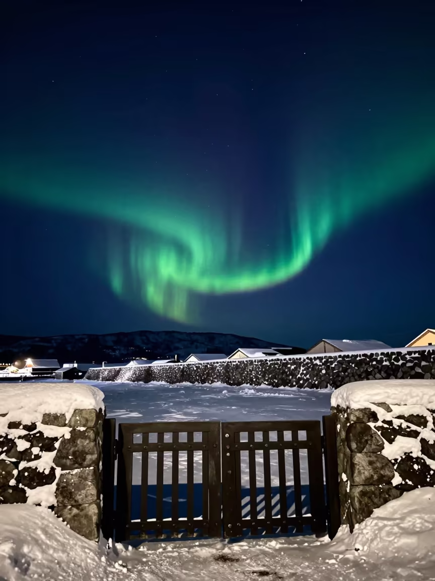 Northern Lights Over Hokkaido Harbor Wall in beneath a hard winter sky over snowfields in Hokkaido