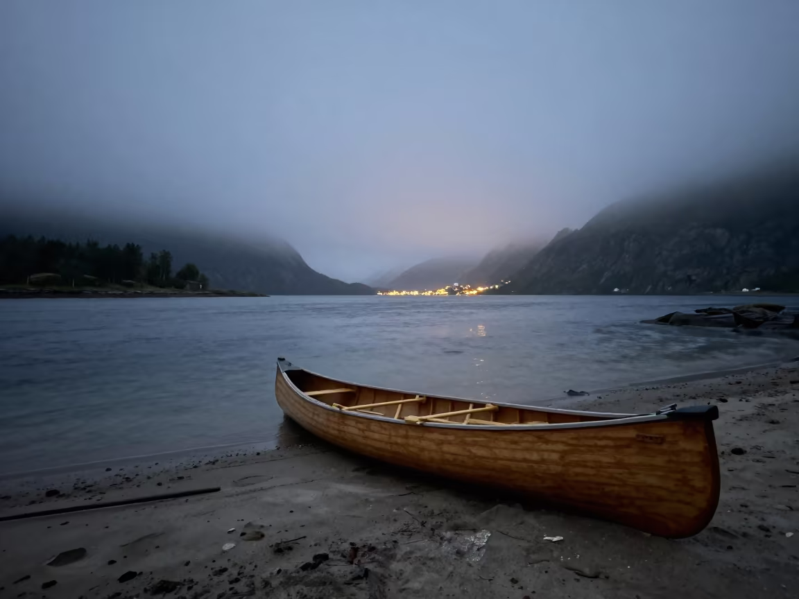 Norwegian Canoe on Sandy River Island at Dusk in across a remote ferry crossing in Norway