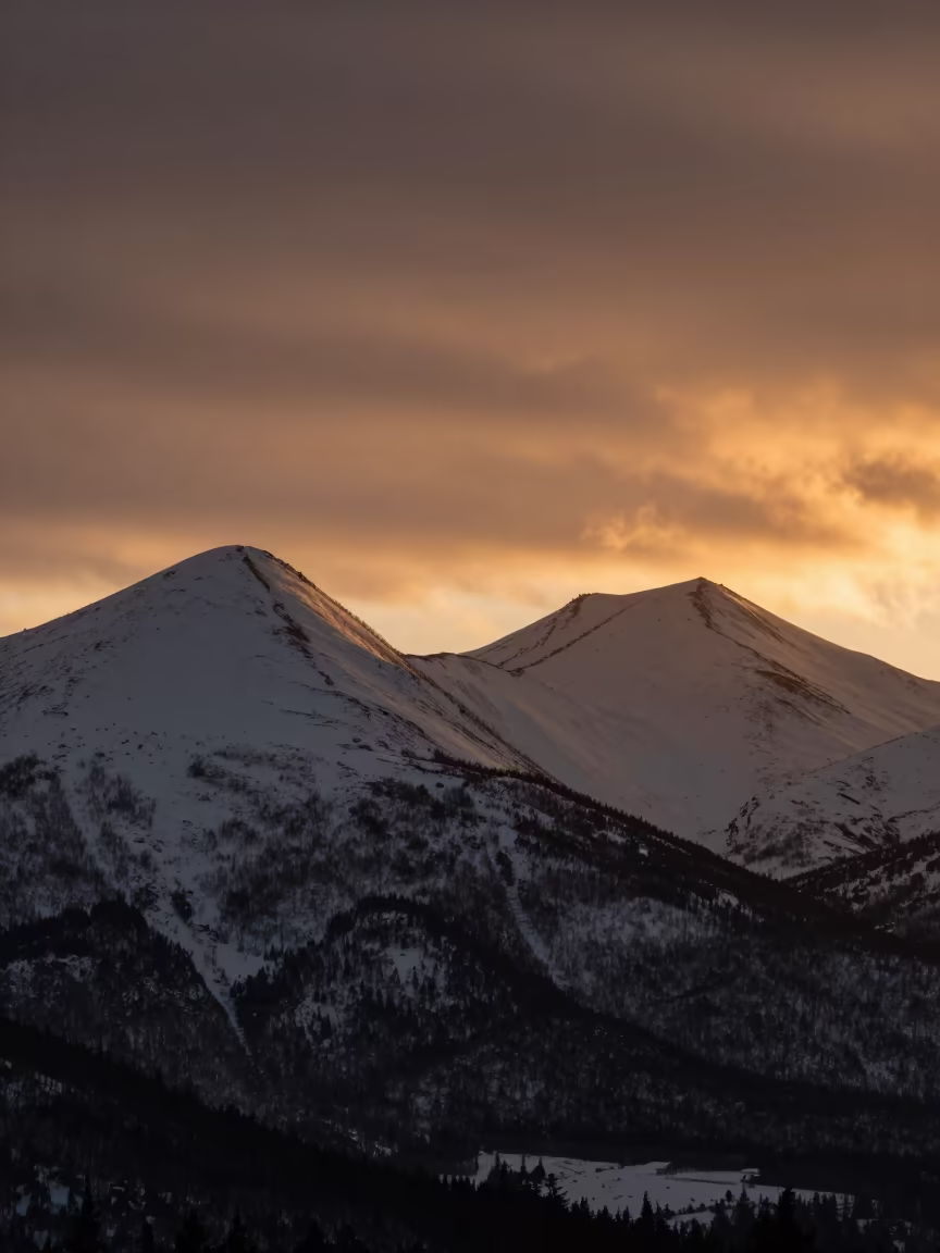 Ontario Col Between Snow Peaks in Amber Light in in Ontario