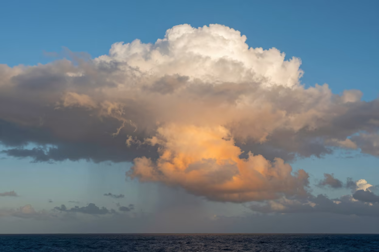 Orange Mammatus Clouds Over Esmeraldas Sky in beneath fast-moving cloud bands near Esmeraldas
