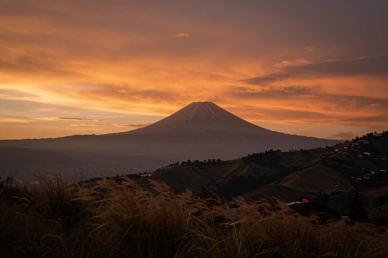 Orange Volcanic Sunset Layers Over Medellin Hills in near Medellín