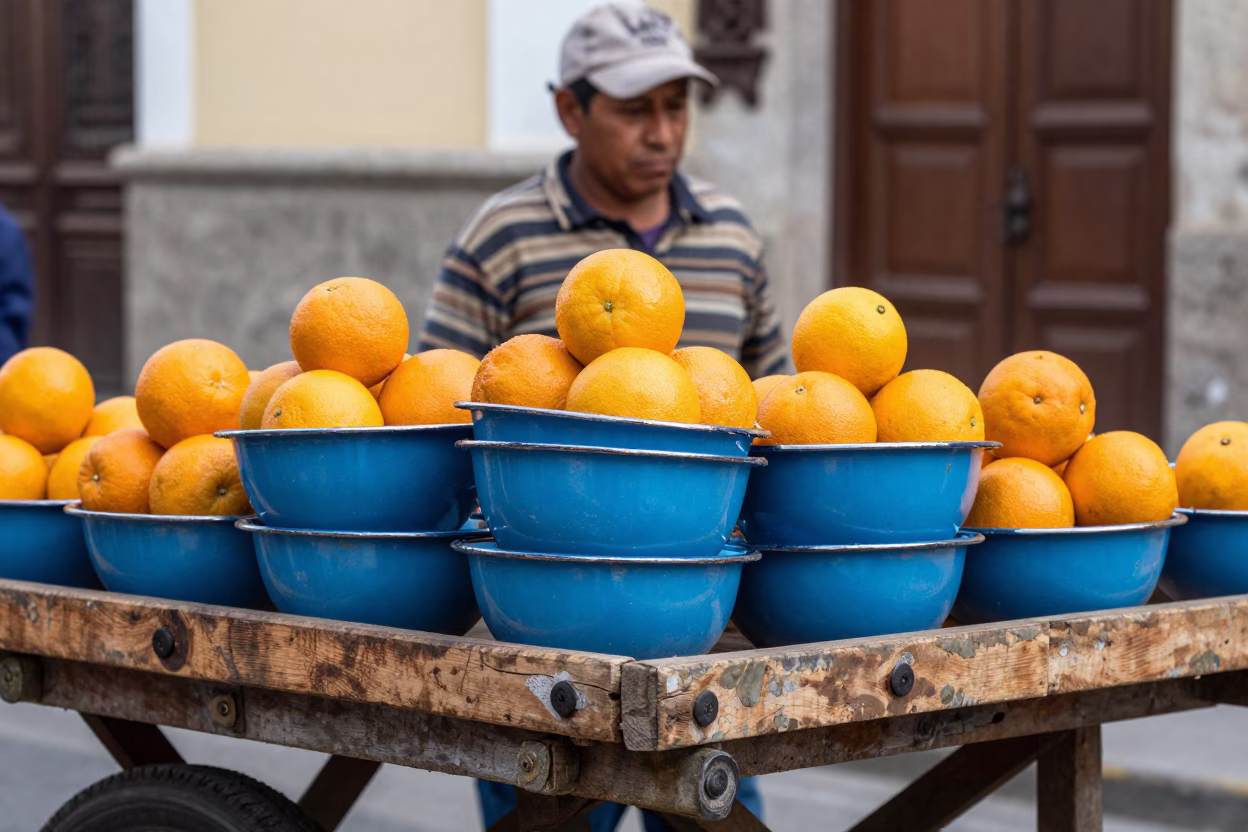 Oranges And Enamel Bowls in Lima at Noon Light in in Lima, Peru