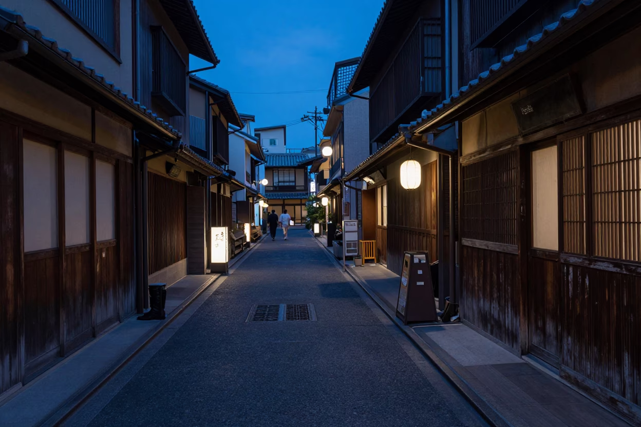 Osaka Evening Blue Hour Street Scene with Traditional Boot Scraper and Local Pedestrians in in Osaka, Japan