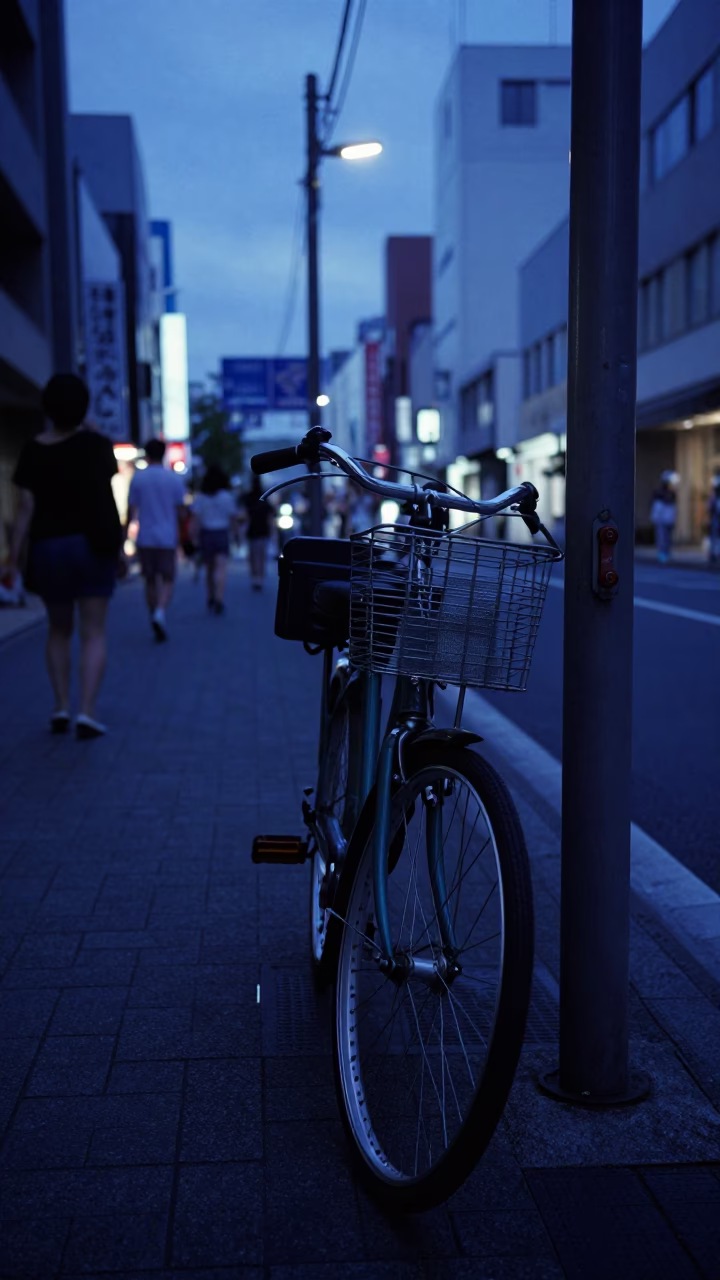 Osaka Japan Blue Hour Street Scene with Vintage Bicycle and Iron Deadbolt in in Osaka, Japan