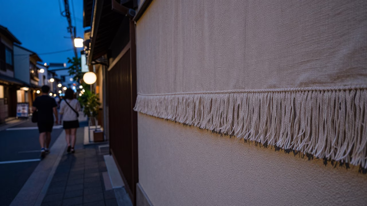 Osaka Japan Indigo Twilight Street Scene with Linen Fringe and Urban Details in in Osaka, Japan