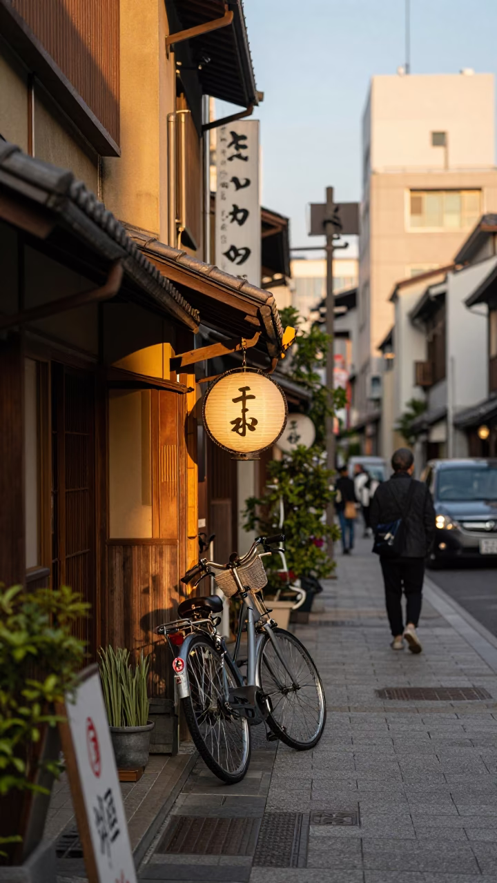 Osaka Japan street scene at golden hour with traditional elements and urban life in in Osaka, Japan