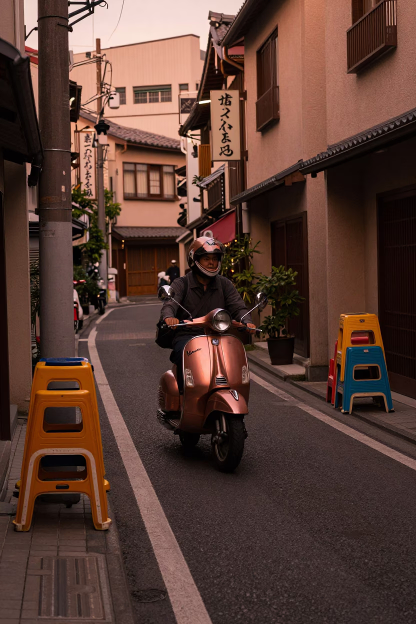 Osaka Japan Street Scene Before Dusk with Scooter and Metro Train in in Osaka, Japan