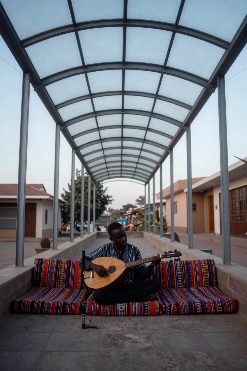 Oud Resting on Cushions in Ngaoundere Arcade in inside a glass-roofed arcade in Ngaoundéré