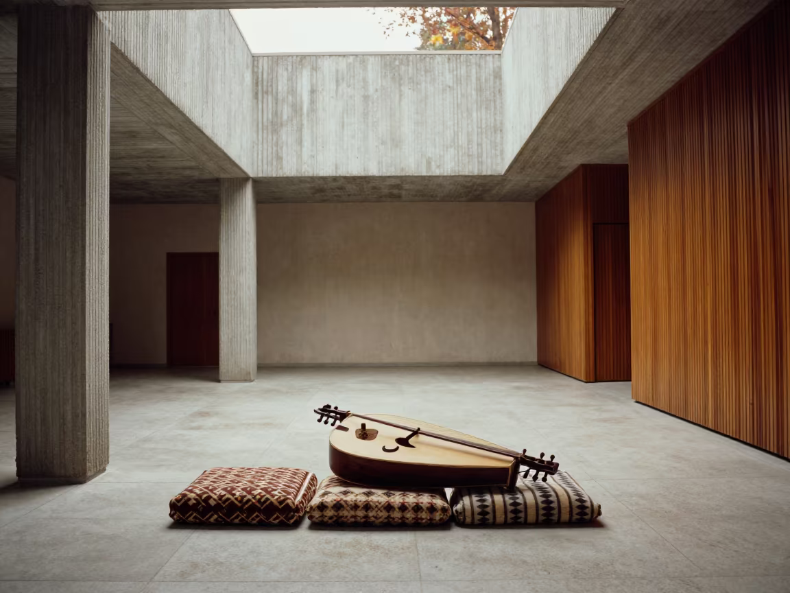 Oud Resting on Cushions in Concrete Lobby in inside a ribbed concrete lobby in Alice Springs