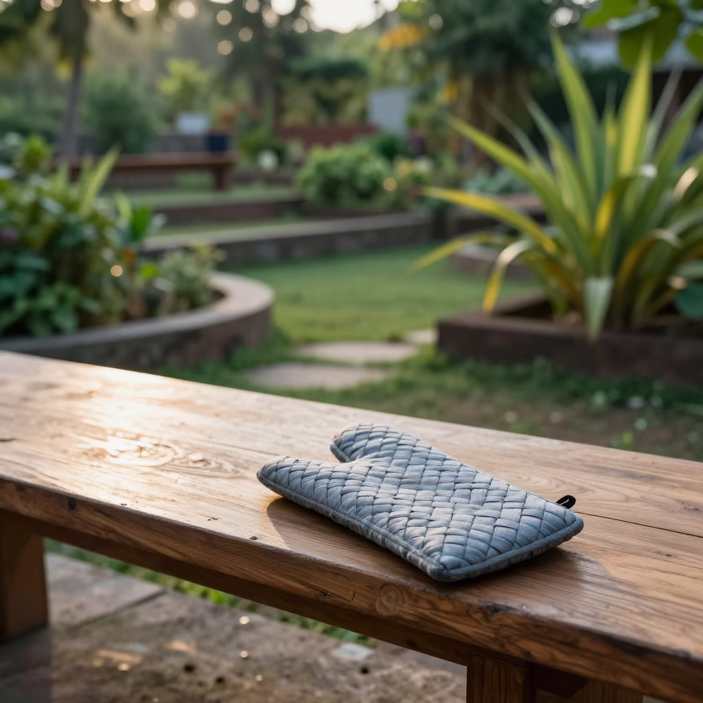 Oven Mitt on Cedar Bench in Garden in among terraced garden plots near Bhilai