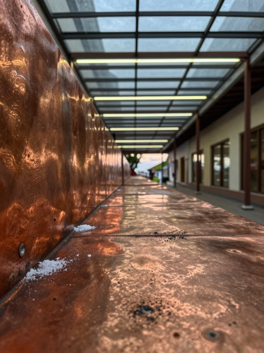 Oxidized Copper Rainwater Neon Study in inside a glass-roofed arcade in Paramaribo