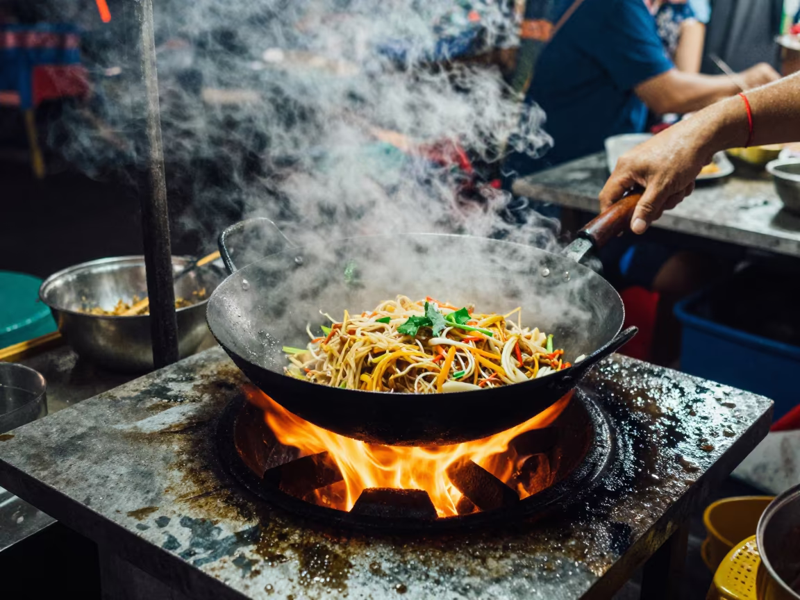 Pad Thai Wok Tossed High Flame Bangkok Market Night in on a weathered outdoor table near Phuket