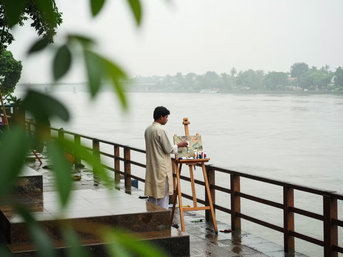 Painter at Riverside Easel in Monsoon Kolkata in near a riverside landing in Kolkata