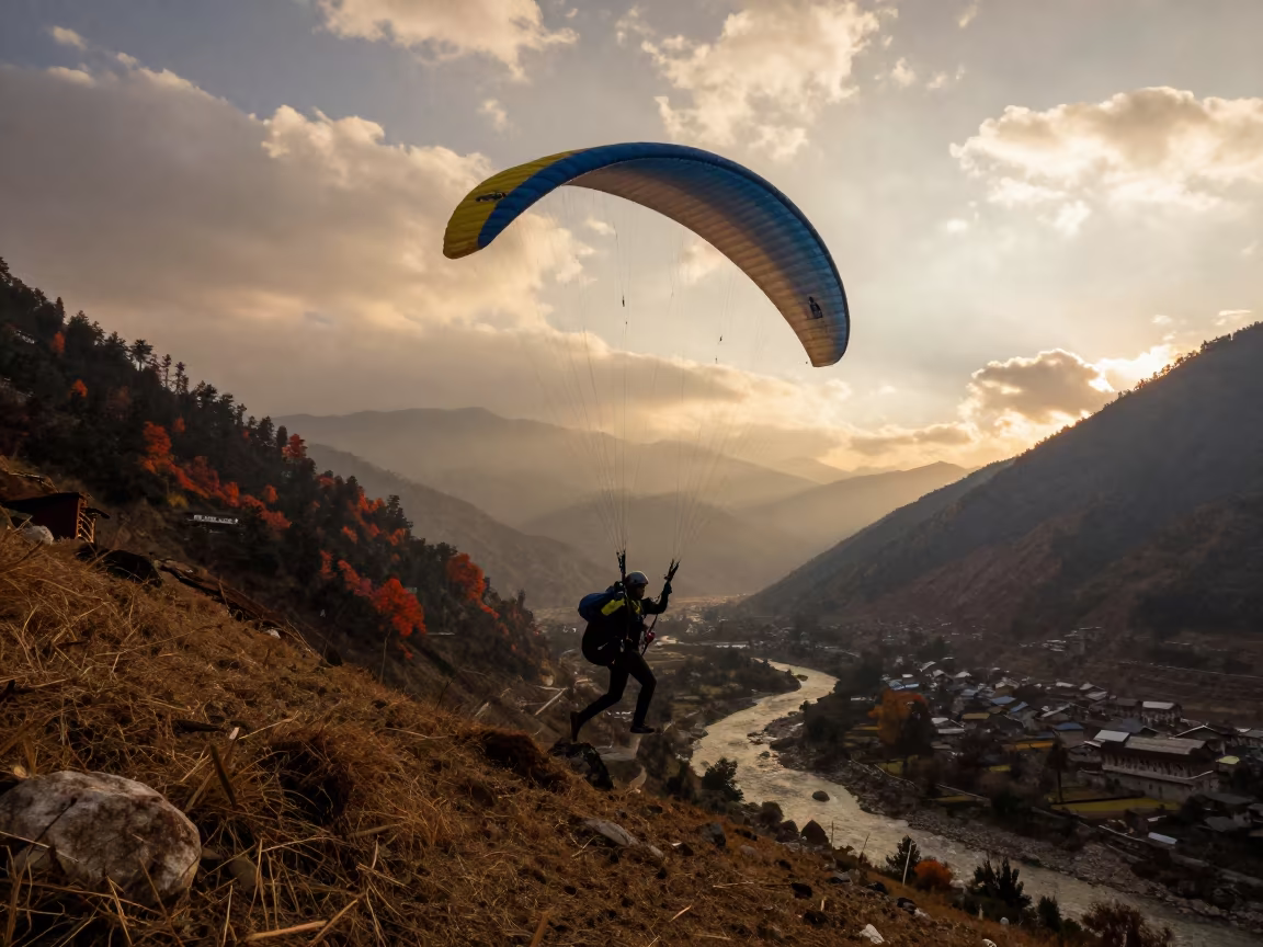 Paraglider Launching Over Pokhara Valley in by a riverbank near Pokhara