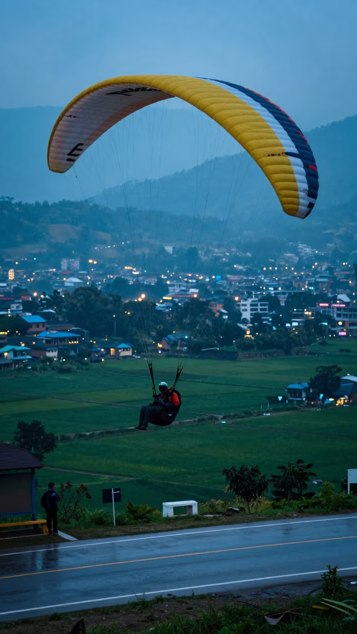 Paraglider Over Kathmandu Valley Winter Twilight in at a roadside stop near Kathmandu