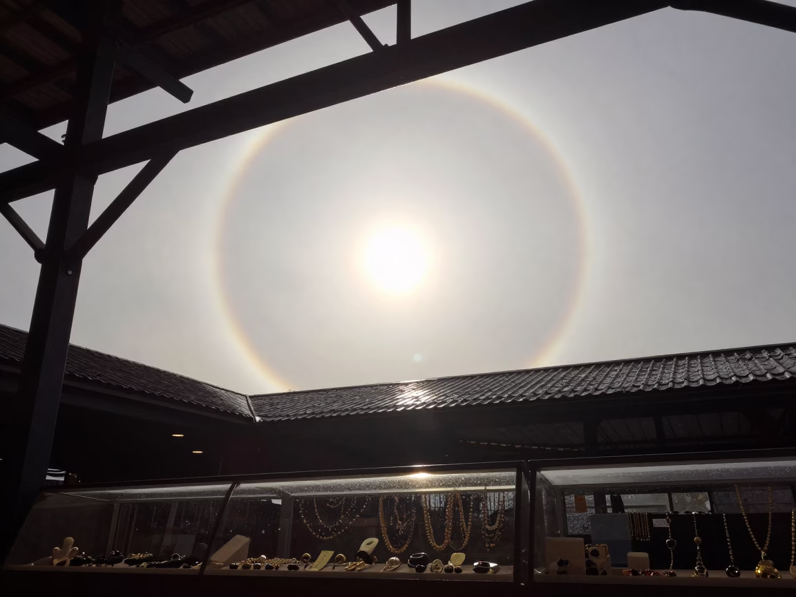 Parhelic Circle Ring Over Arnhem Bazaar at Dawn in at a jewelry counter inside a covered bazaar in Arnhem