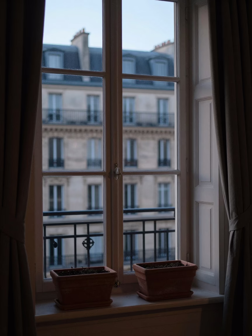 Parisian Apartment Interior Before Dawn with Window Boxes and Vintage Details in in Paris, France