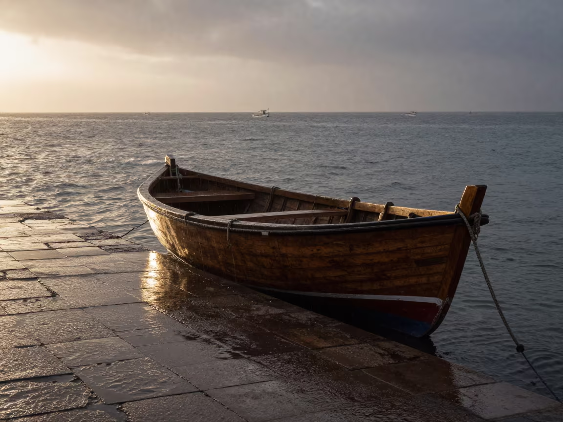 Pearl Diving Boat on Tunisian Causeway Dawn in on a wind-open causeway in Tunisia