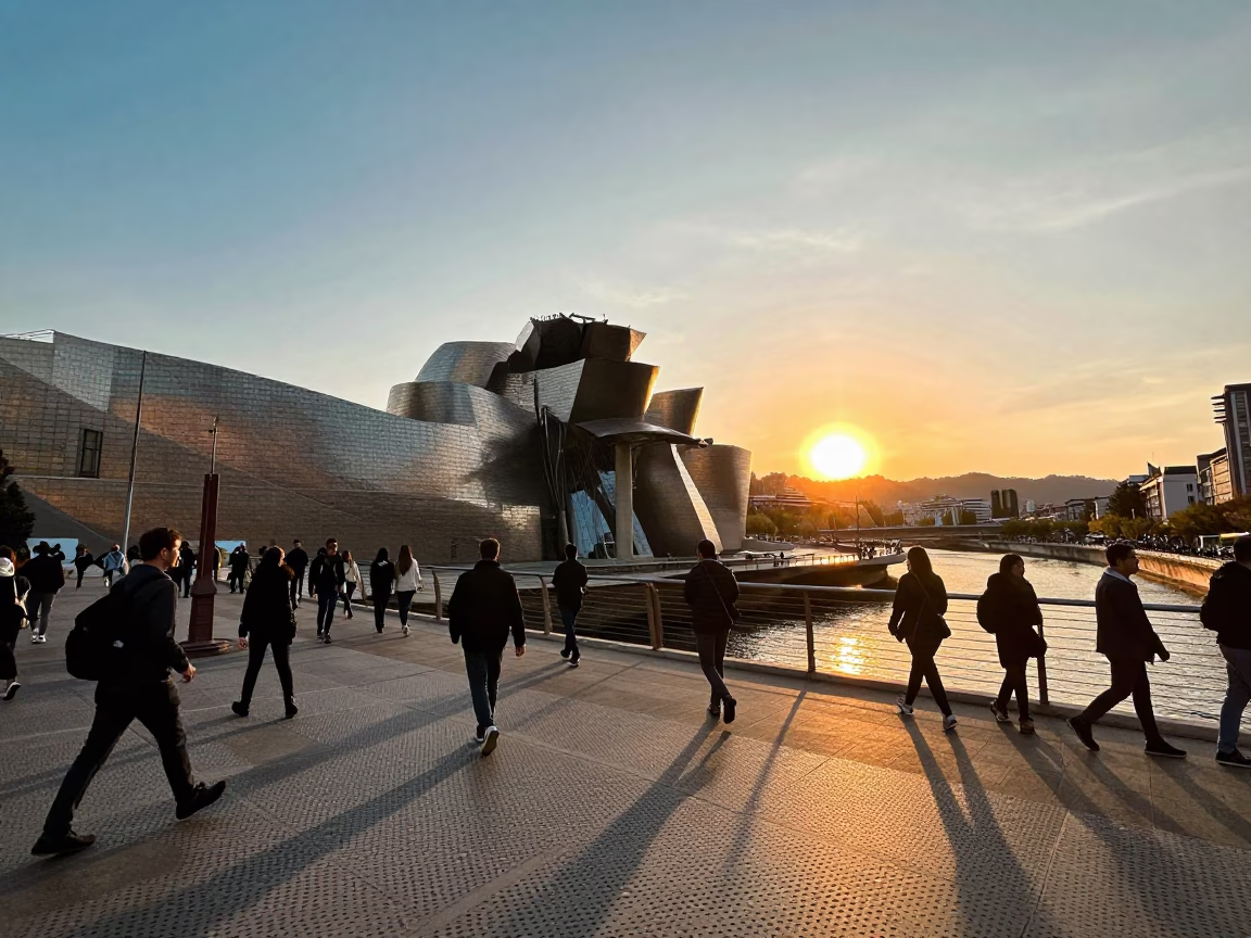 Pedestrians crossing perforated metal overpass in Bilbao Spain at sunset in in Bilbao, Spain