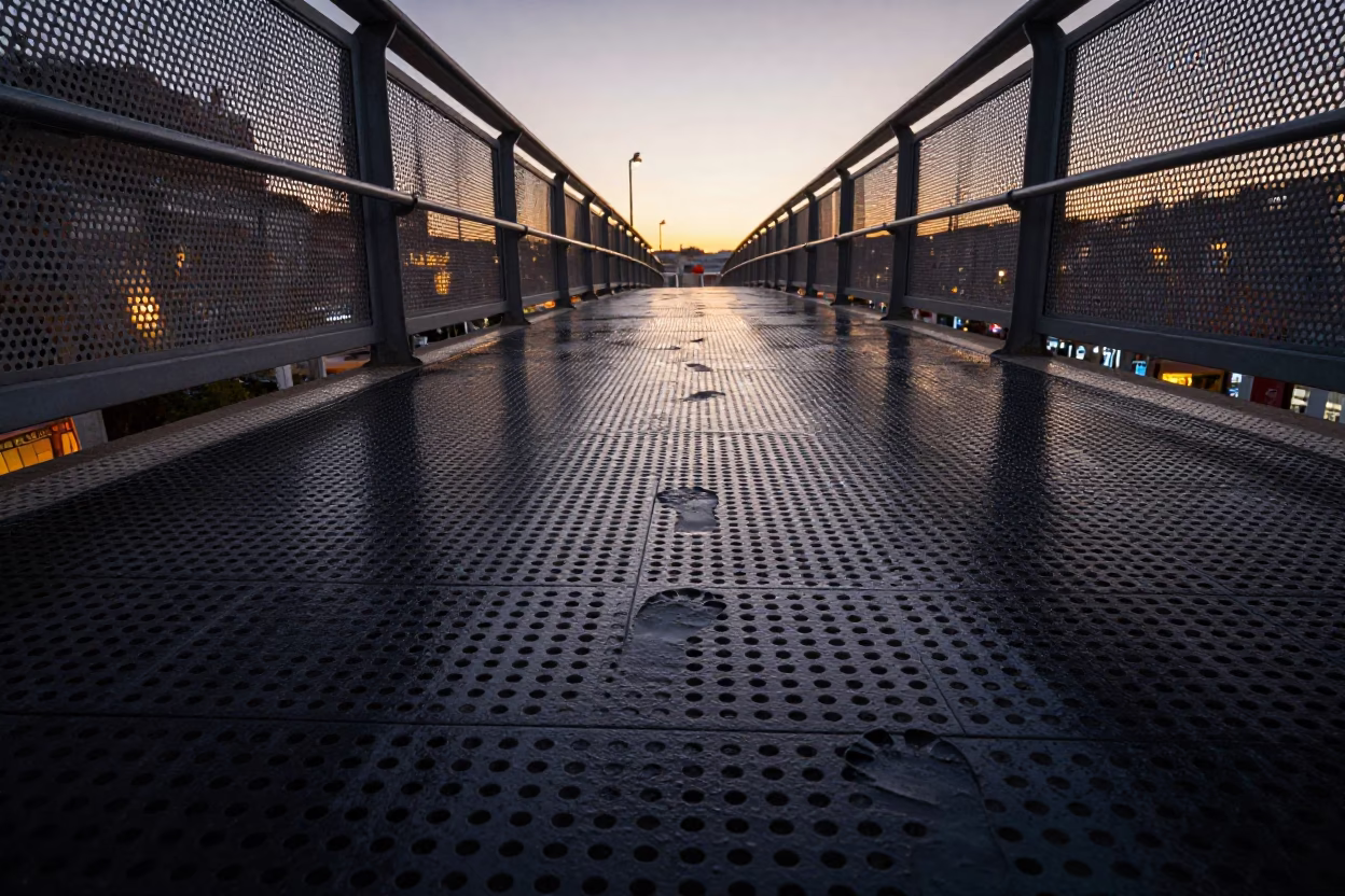 Perforated Metal And Wet Footsteps in Lisbon in in Lisbon, Portugal