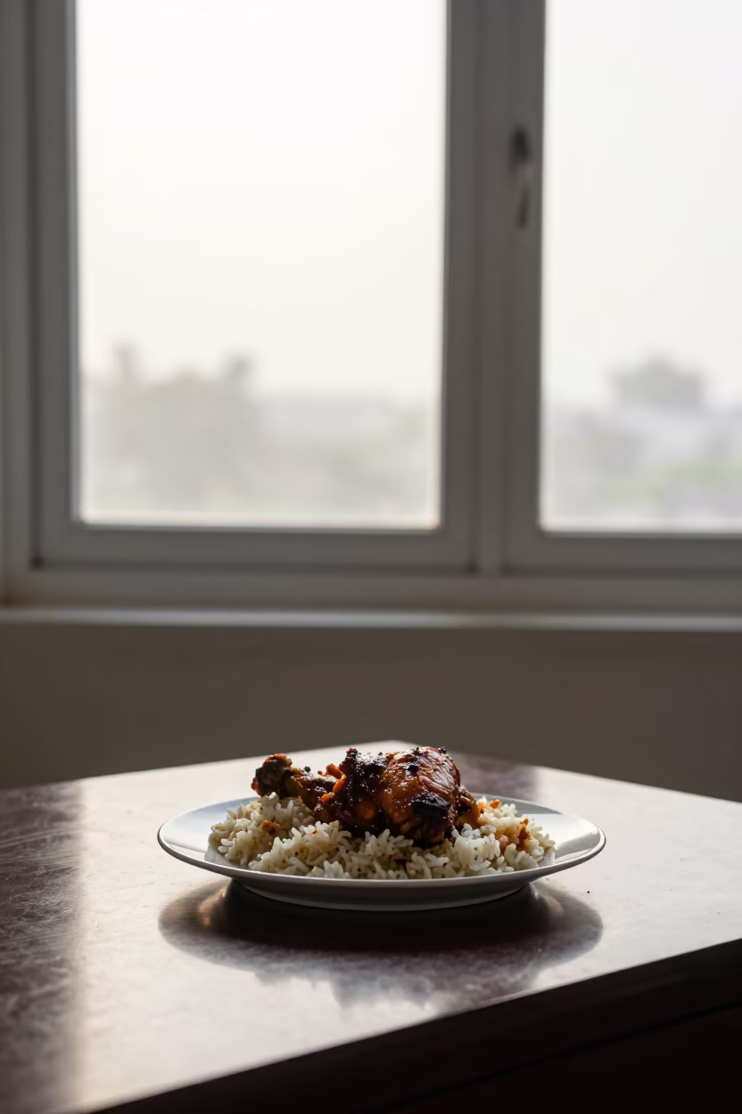 Peri Peri Chicken and Rice on Barishal Desk in on a writing desk in Barishal