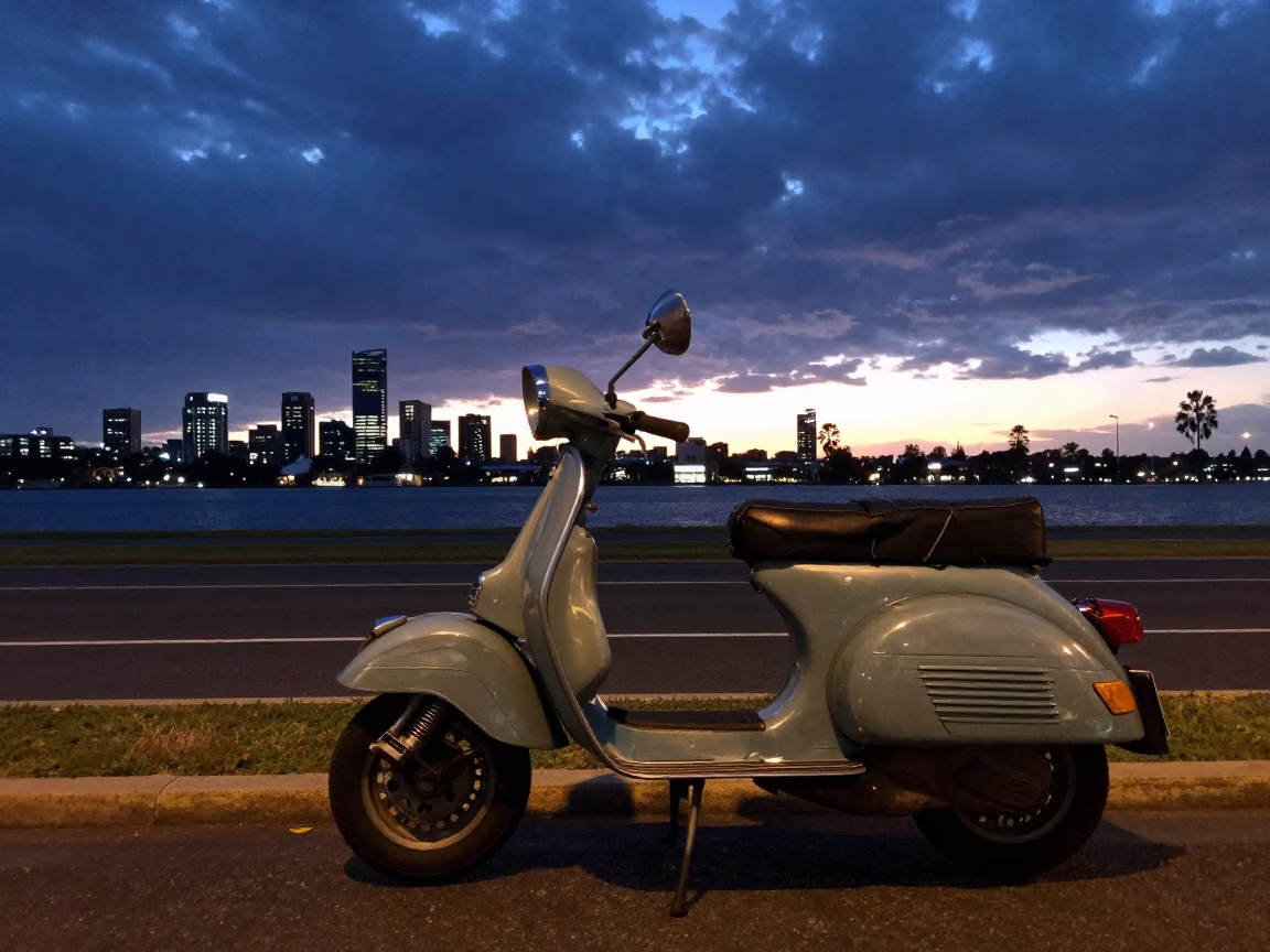 Perth Swan River sunset scene with vintage scooter and local commuter in in Perth, Western Australia, Australia
