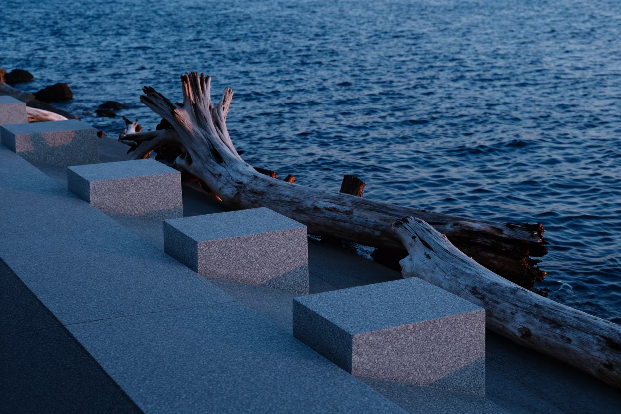 Perth waterfront evening scene with driftwood and water ripples in blue light in in Perth, Western Australia, Australia