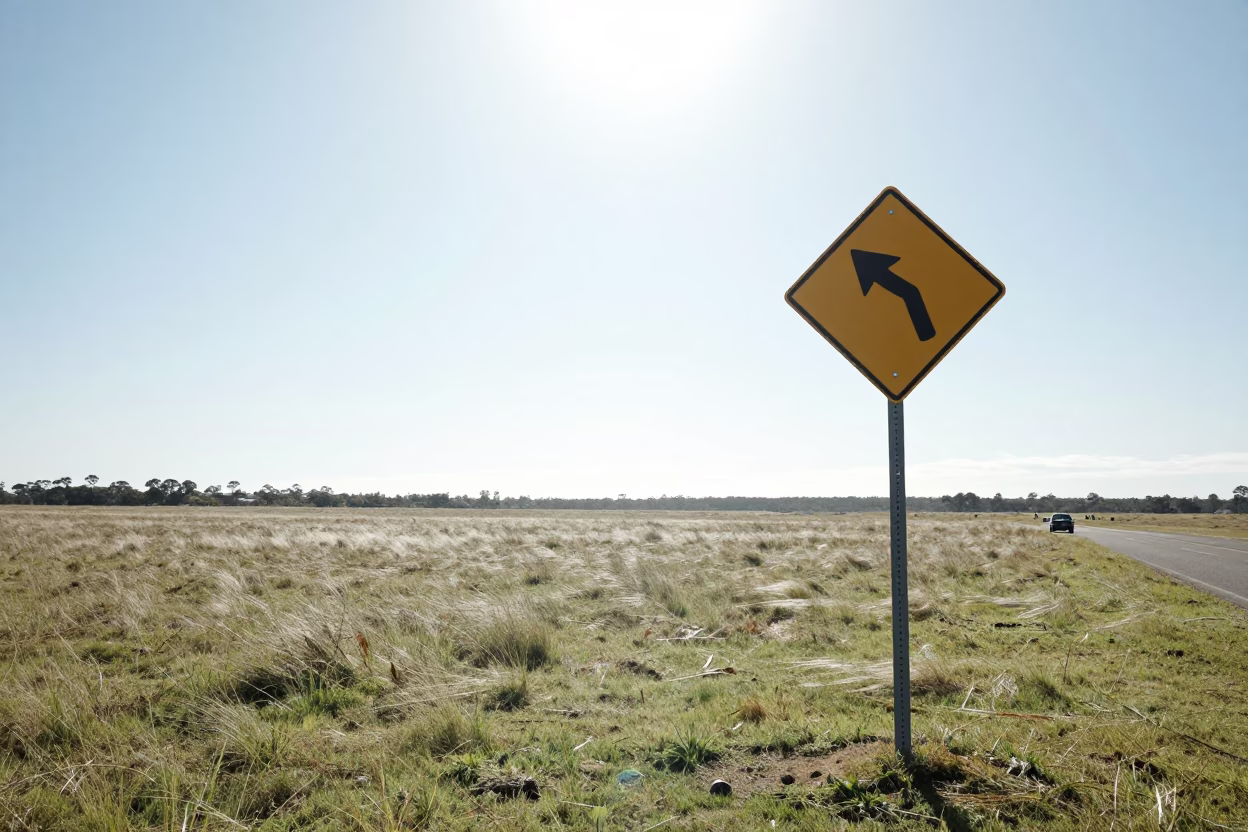 Perth Western Australia Noon Landscape Shot with Pipeline Crossing Sign in Windswept Grassland in in Perth, Western Australia, Australia