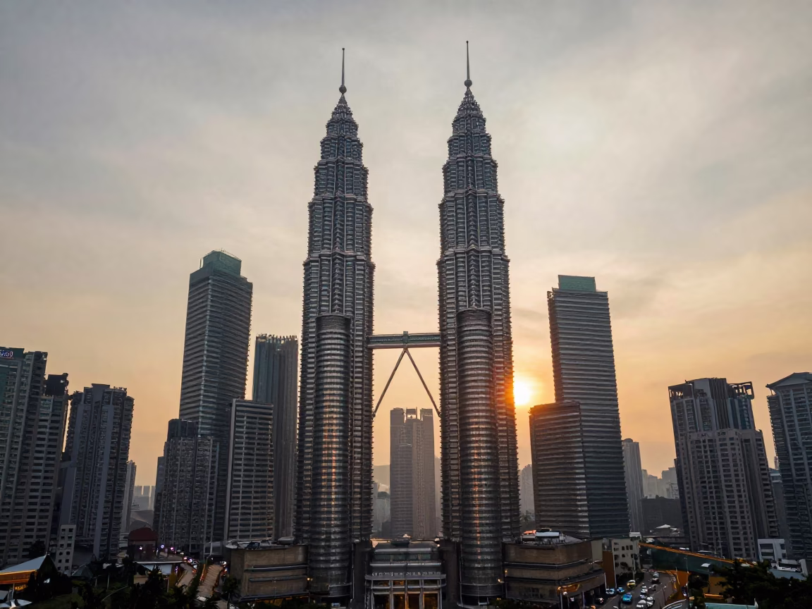 Petronas Towers And Urban Landscape at Golden Hour in Kuala Lumpur in in Kuala Lumpur, Malaysia