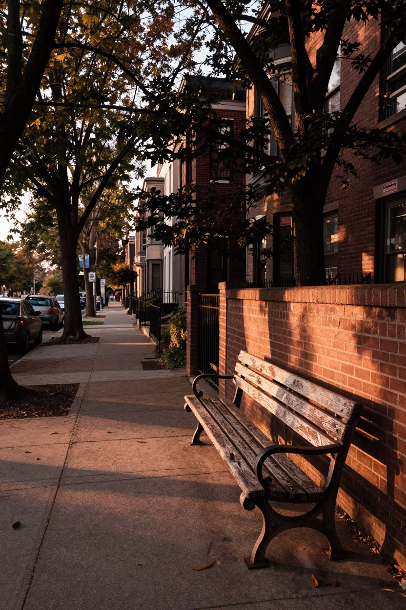 Philadelphia Street Scene Before Dusk with Scratched Wooden Bench and Local Urban Details in in Philadelphia, Pennsylvania, United States