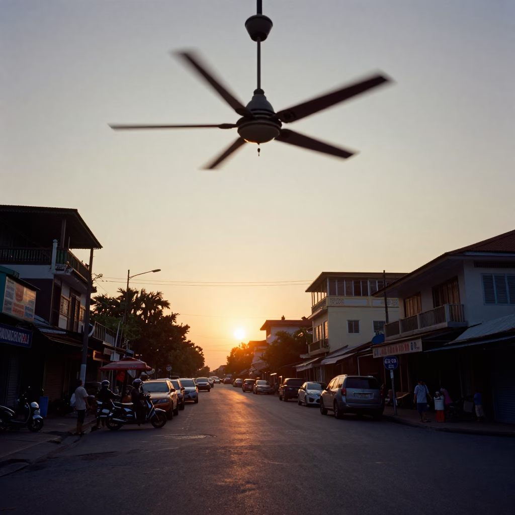 Phnom Penh Cambodia Sunset Street Scene with Rattling Ceiling Fan and Chalkboard Lesson in in Phnom Penh, Cambodia