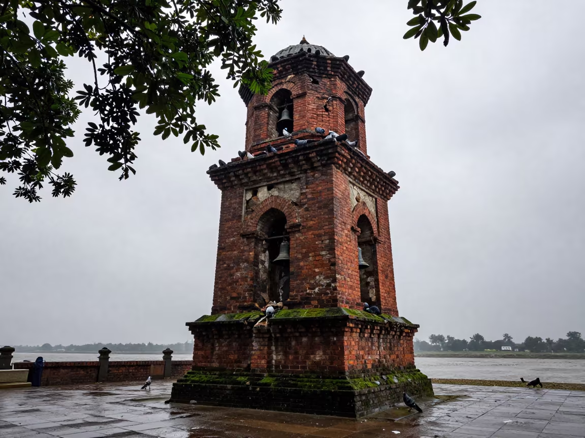 Pigeons Nesting in Crumbling Monsoon Bell Tower in beside a tidal inlet near Hafizabad