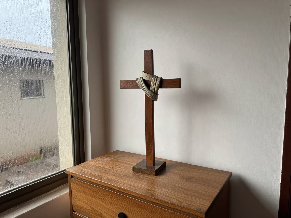 Pilgrim Staffs Draped on Wayside Cross in on a hotel dresser in Maiduguri