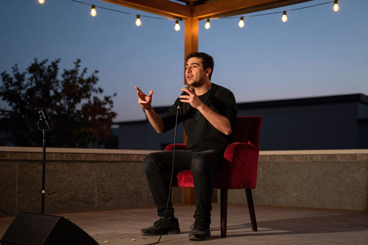 Poet gesturing on velvet chair in Asyut twilight in on a velvet chair in Asyut
