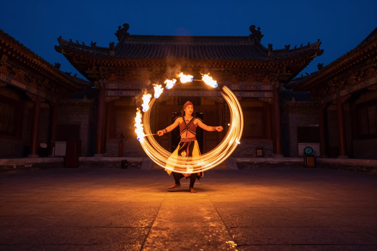 Polynesian Fire Dancer in Lanzhou Temple Night in in a temple courtyard in Lanzhou