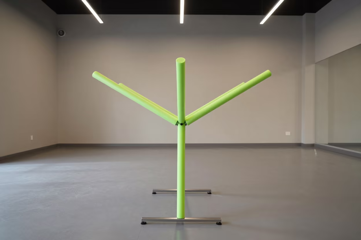 Pool Noodle Drying Rack After Studio Reset in inside a spin studio under class lights in Almere