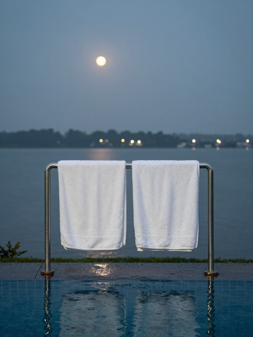 Poolside Towel Station After Summer Squall in Kollam in beside a valet stand after rain near Kollam