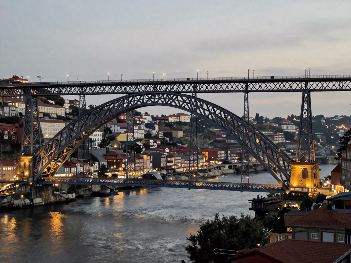 Porto Douro River And Dom Luis Bridge Illuminated in in Porto, Portugal