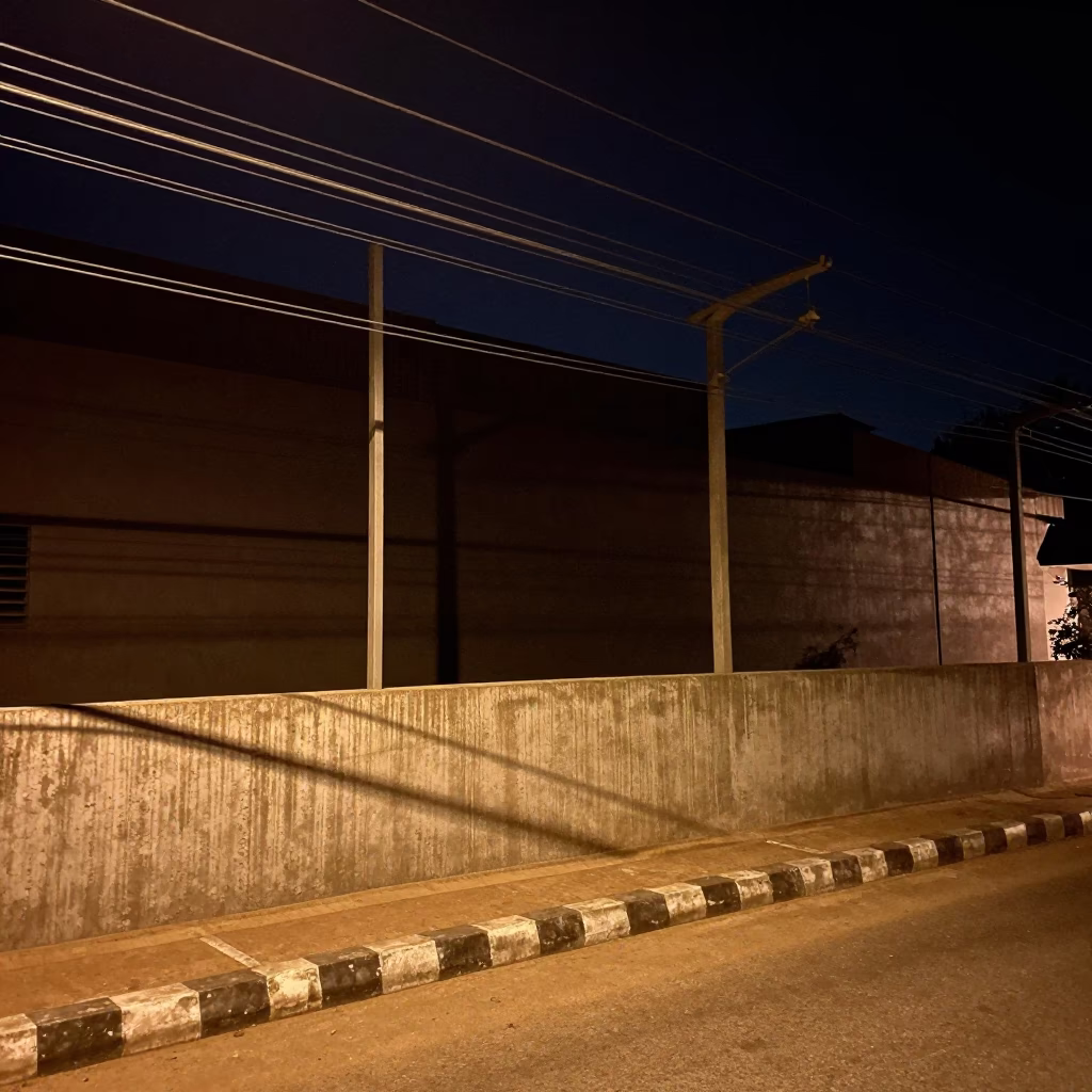 Power Cable Shadows on Ondo Arcade Wall in inside a glass-roofed arcade in Ondo
