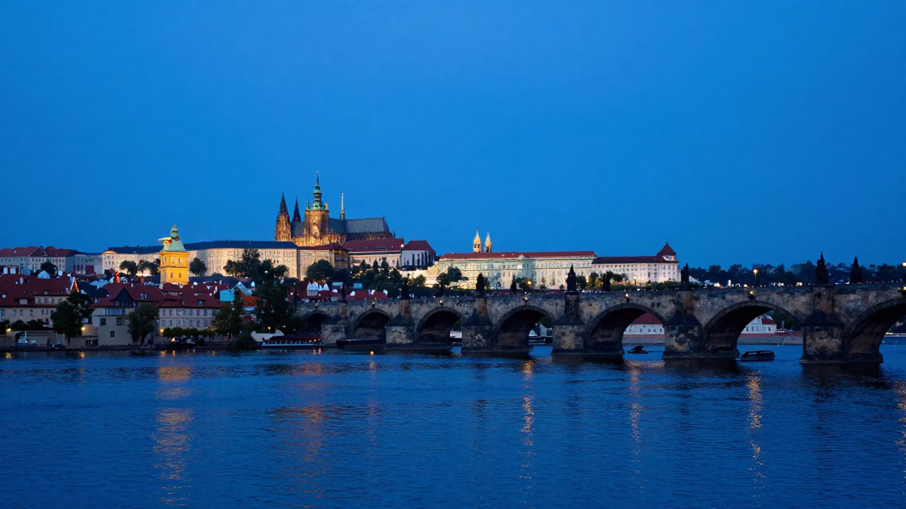 Prague Evening Blue Hour View of Vltava River and Charles Bridge Stone Architecture in in Prague, Czech Republic