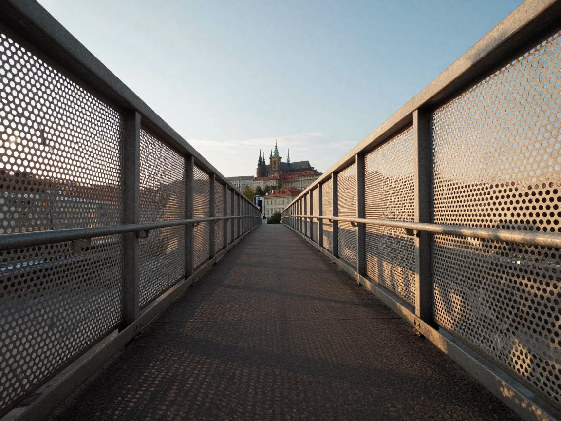 Prague Late Afternoon Pedestrian Overpass View with Perforated Metal and Wet Footsteps in in Prague, Czech Republic