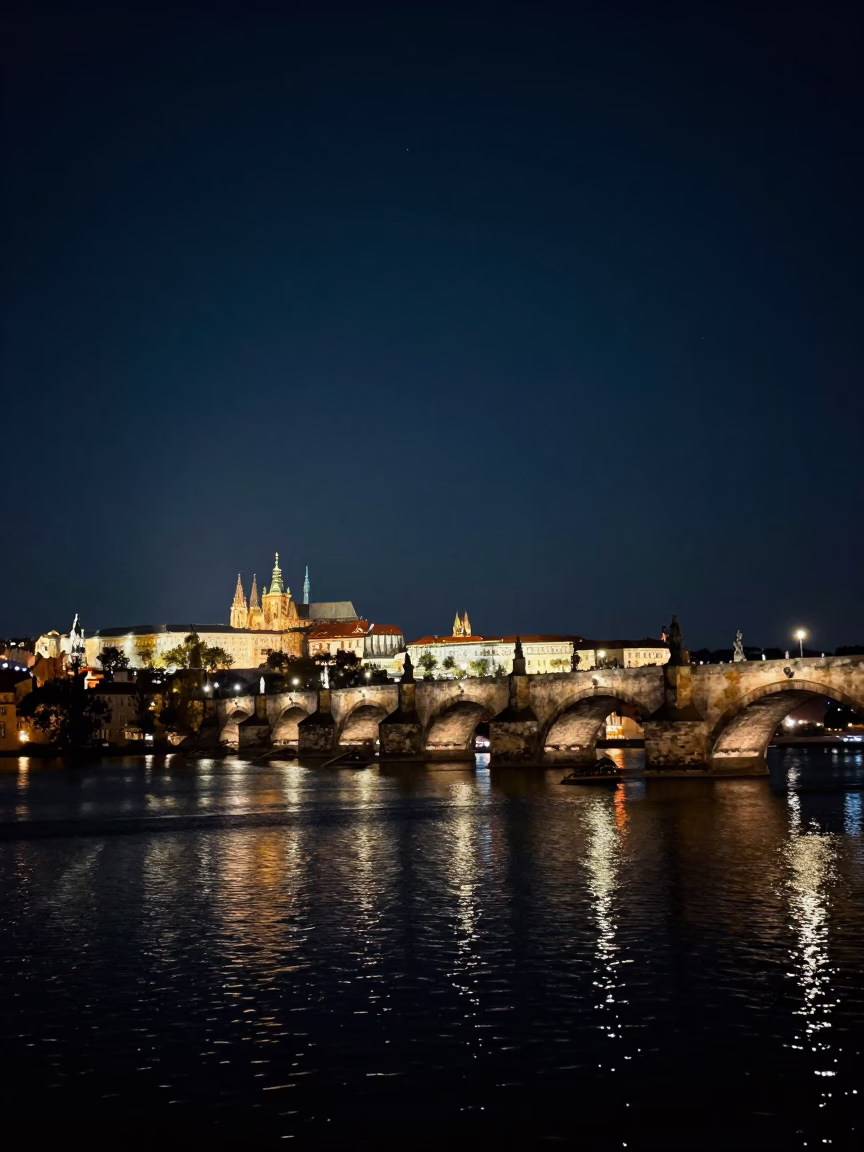 Prague Night Sky Over Charles Bridge and Vltava River Reflections in in Prague, Czech Republic
