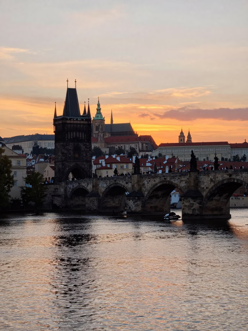 Prague Sunset View of Charles Bridge and Vltava River with Historic Architecture in in Prague, Czech Republic