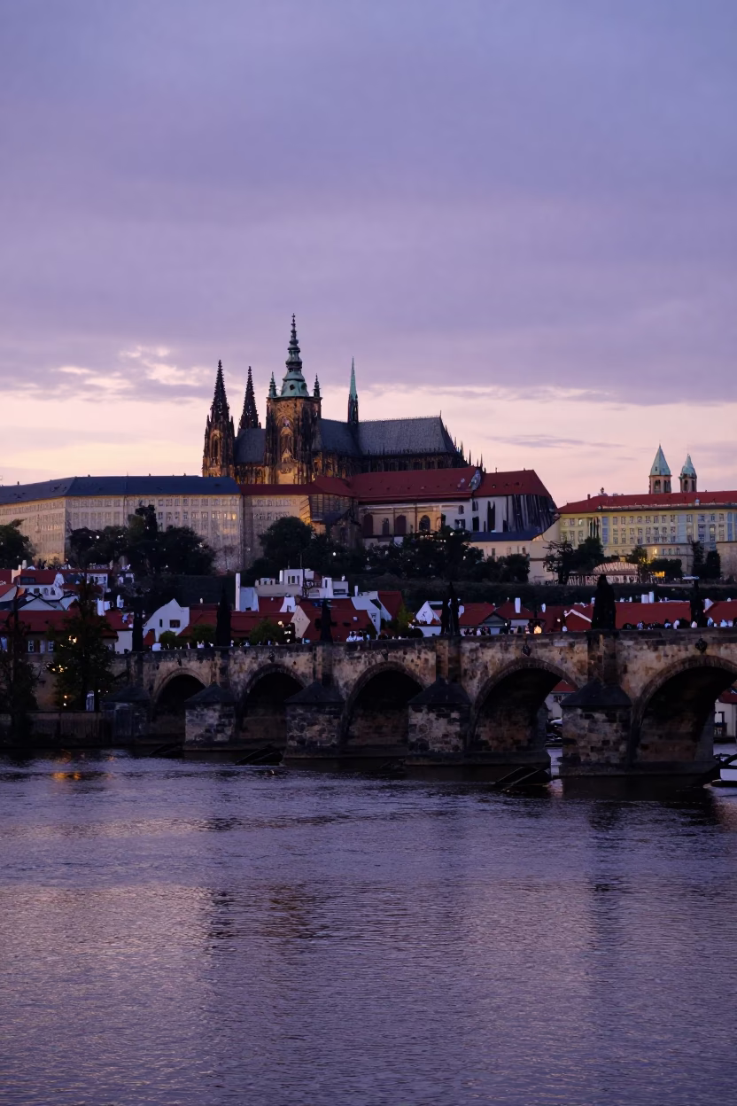 Prague Twilight View of Vltava River and Charles Bridge from Petrín Hill in in Prague, Czech Republic