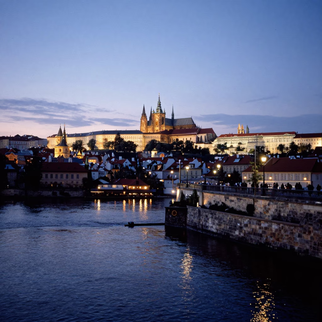 Prague Vltava Riverbank Twilight with Historic Stone Embankment and City Lights in in Prague, Czech Republic