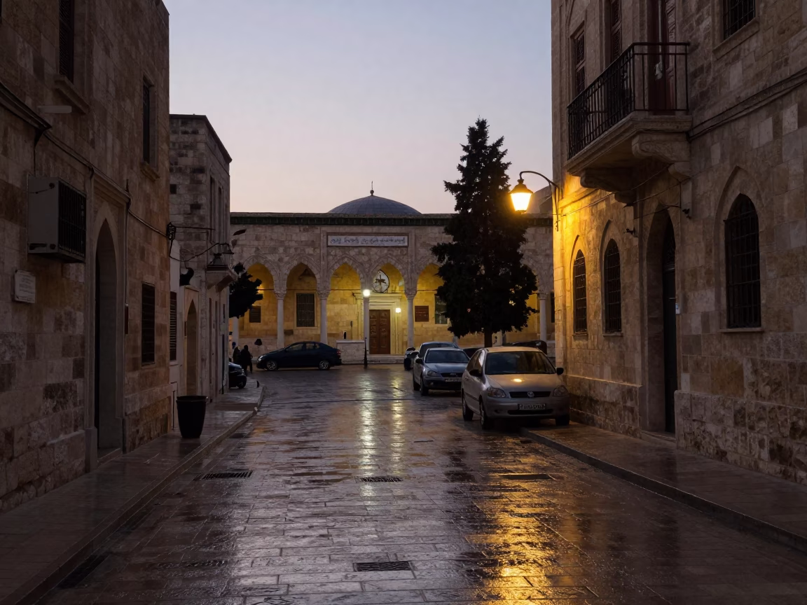 Pre-Dawn Amman Street Scene with University Cloister and Wet Flagstones in in Amman, Jordan