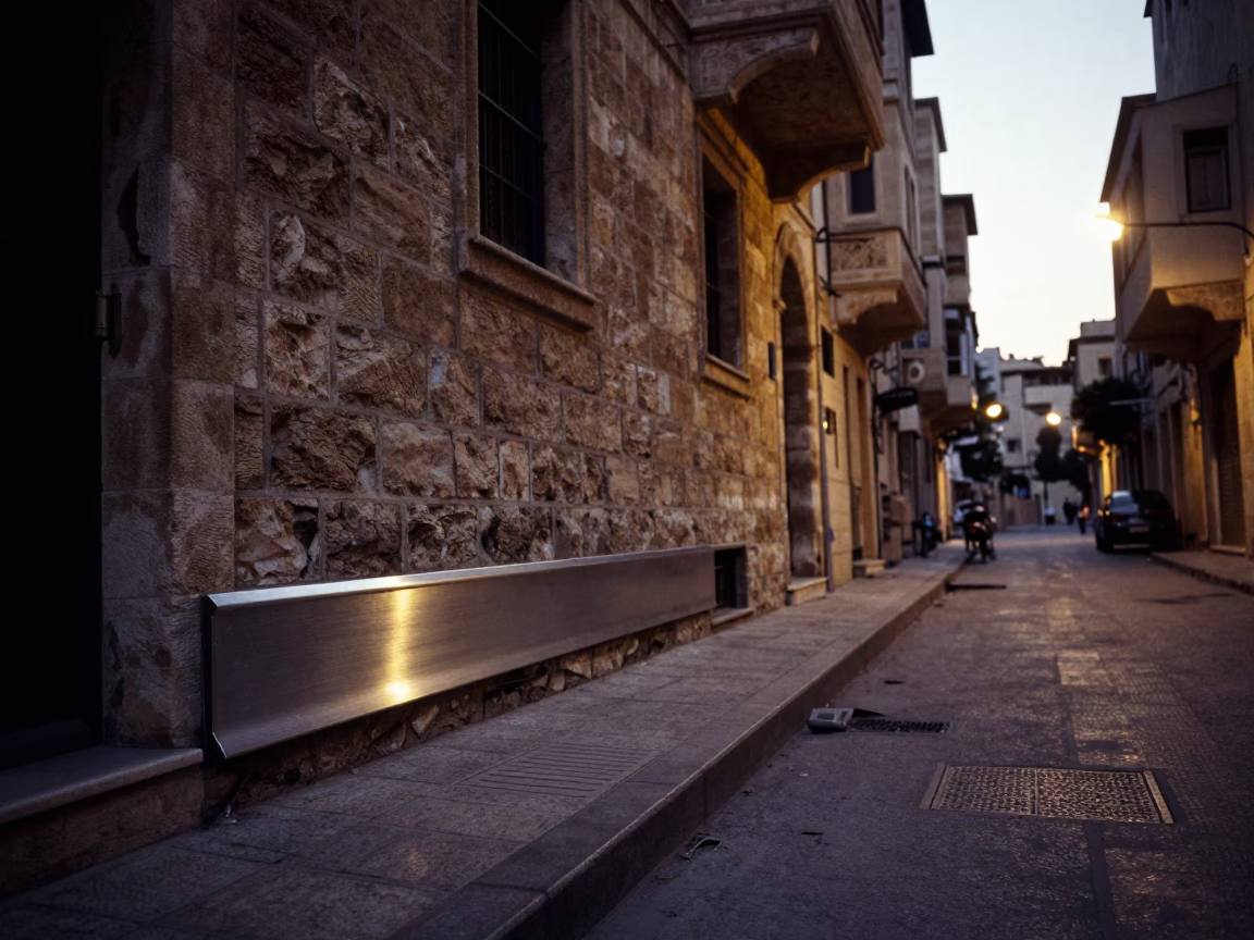 Pre-dawn Beirut street scene with brushed steel sill edge and quiet urban stillness in in Beirut, Lebanon