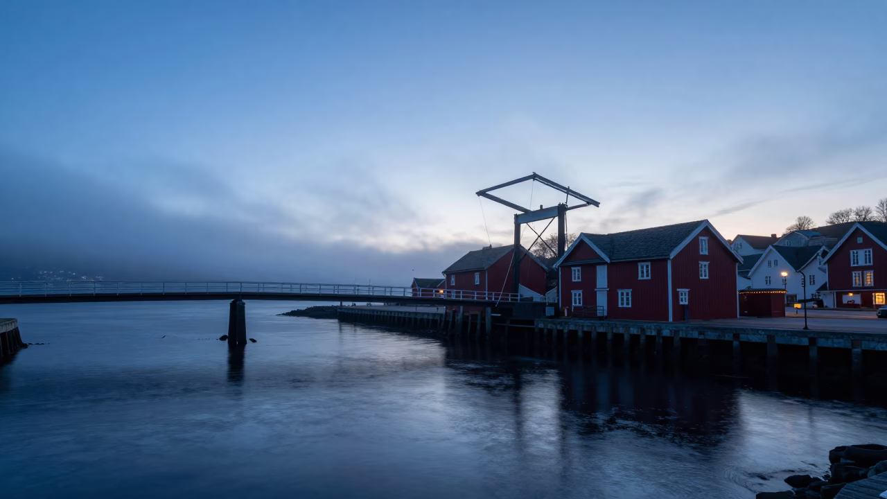 Pre-Dawn Bergen Norway Drawbridge Counterweight House Tidal Channel Mist in in Bergen, Norway
