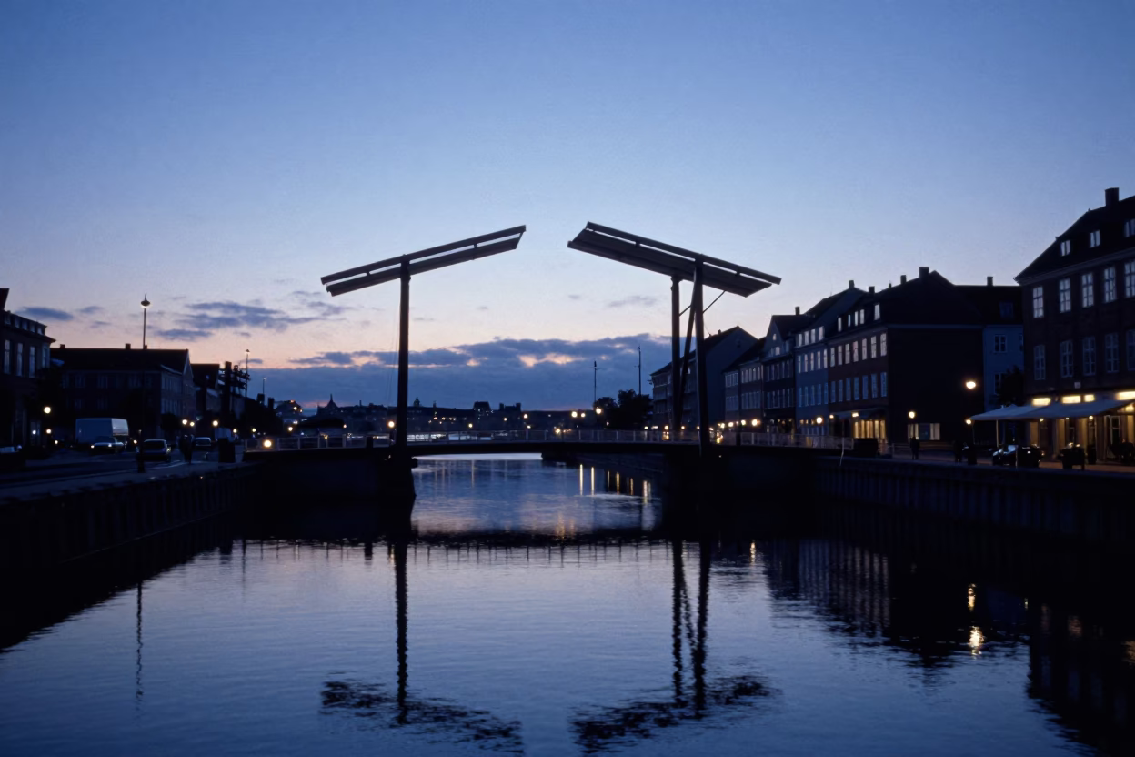 Pre-dawn Copenhagen Harbor Drawbridge Reflection and Canal Scene in in Copenhagen, Denmark
